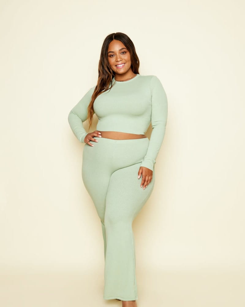 Front of a model wearing a size L Good Life Top in Mint by Dippin' Daisy's Swimwear. | dia_product_style_image_id:272245